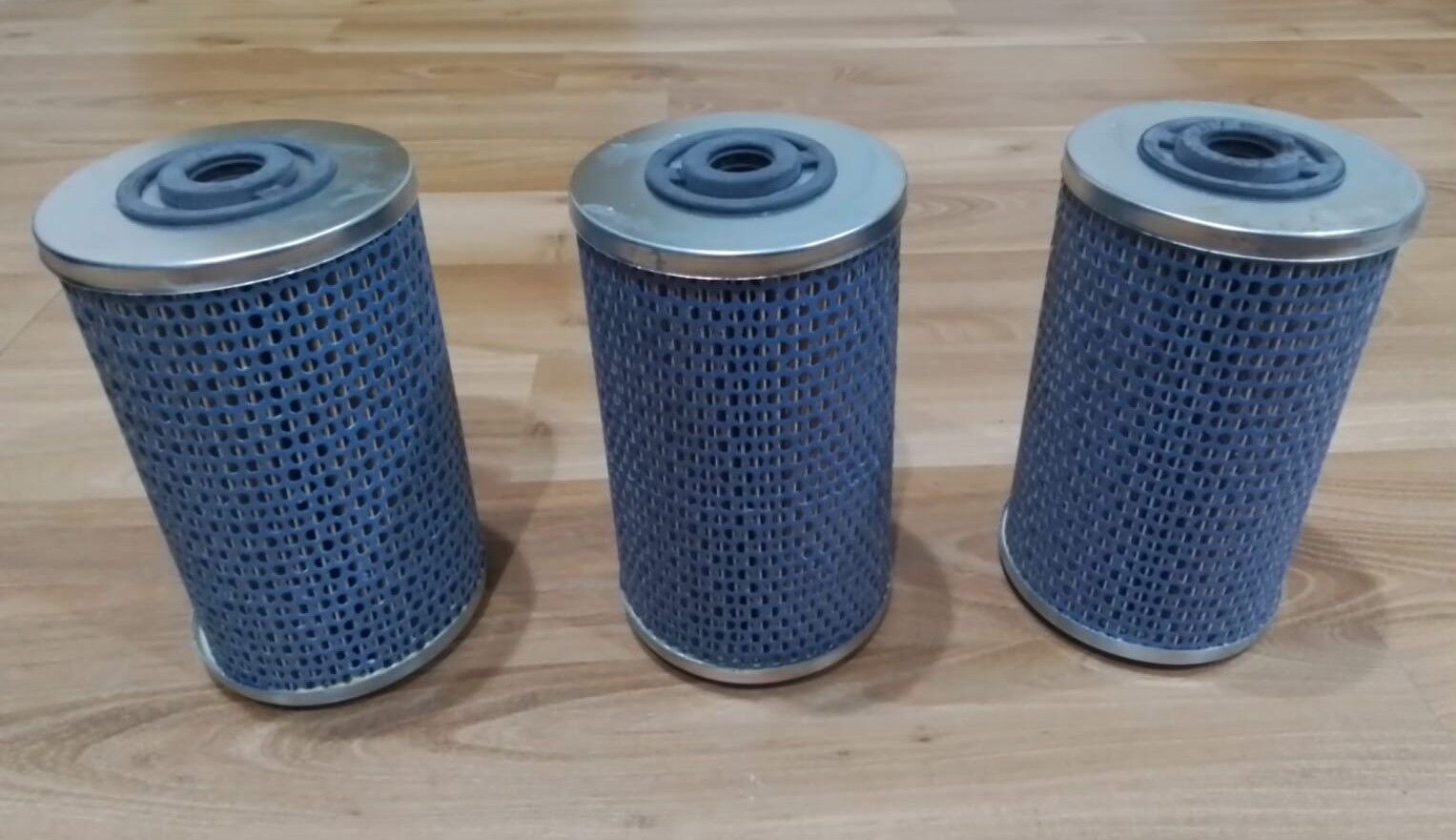 2910-12-128-8594	FILTER ELEMENT,FLUID	0000921705     1457431241